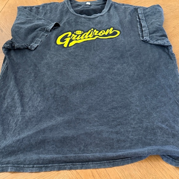 Other - Black Men Gridiron T-Shirt with skeleton playing football as back hit  Logo